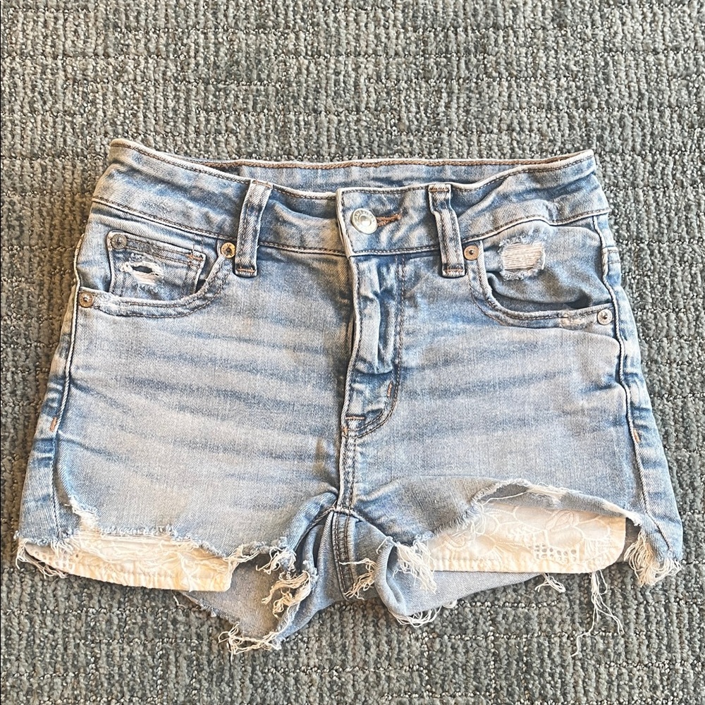 American Eagle Hi-Rise Shortie Light Wash Distressed Denim Shorts Lace Detail